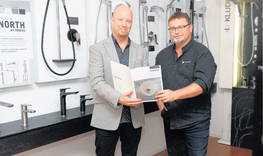 Jon Doherty and Kerry Lord with 50th anniversary catalogue